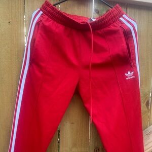 Adidas Red pants with White Stripes